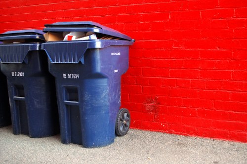 Workers managing construction waste